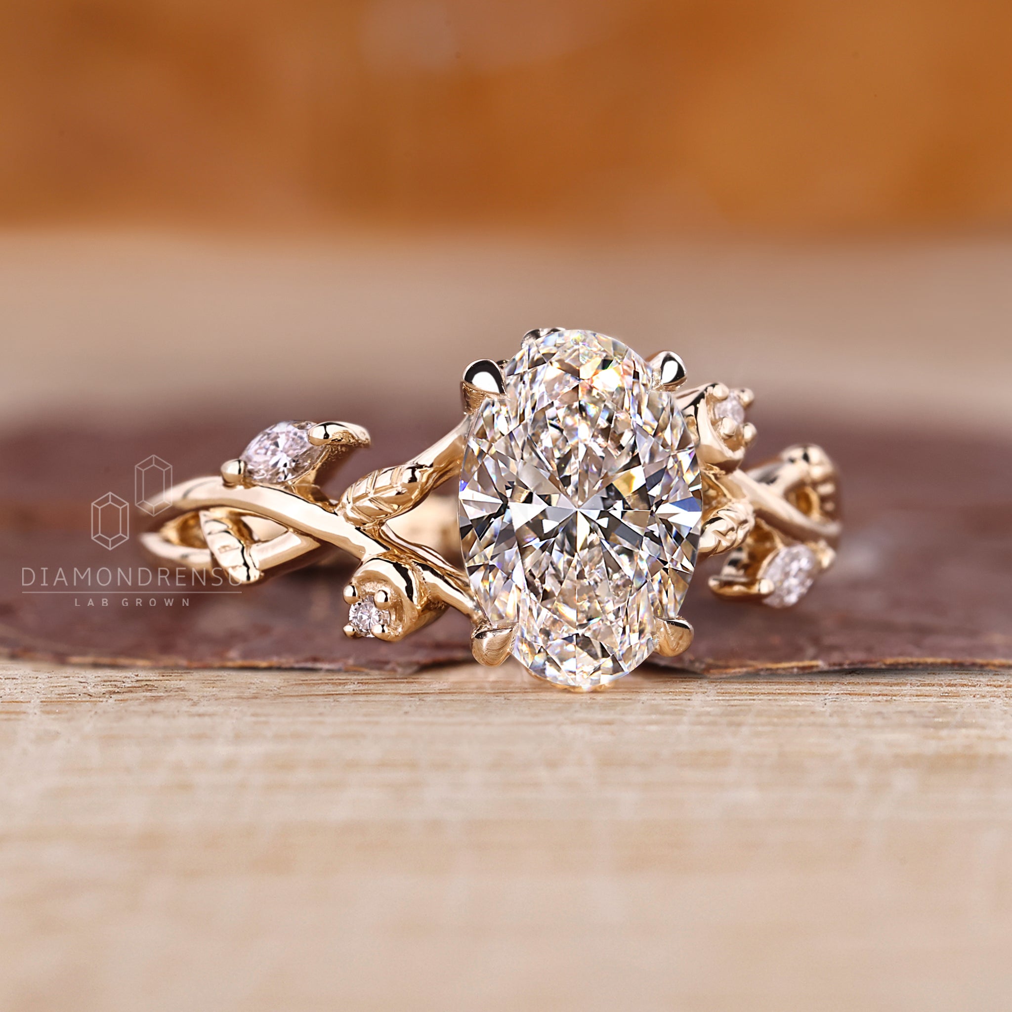 UK engagement ring with lab grown oval and marquise diamonds
