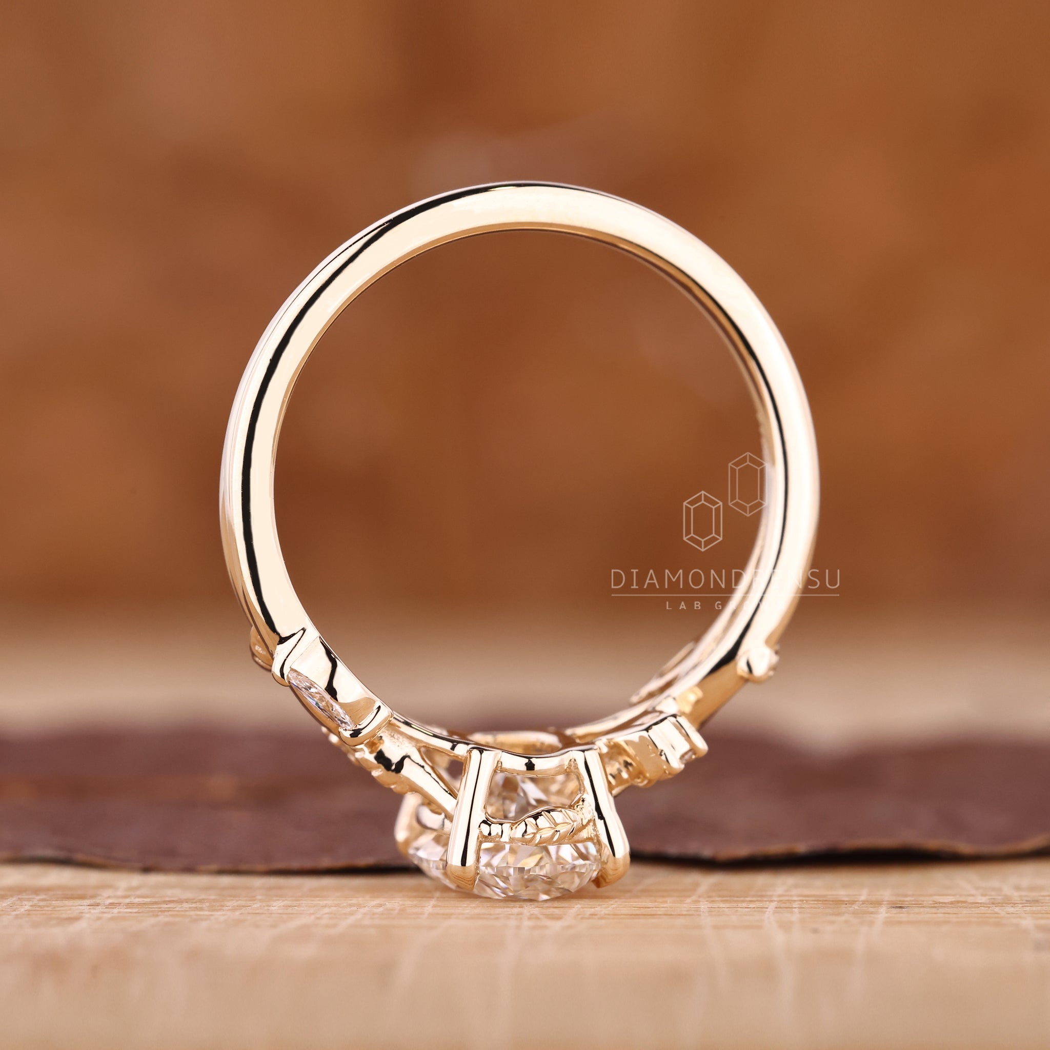 Lab grown oval and marquise diamond ring with prong setting