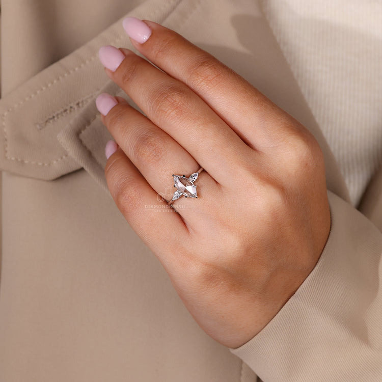 Diamondrensu UK engagement ring in marquise rose cut style.