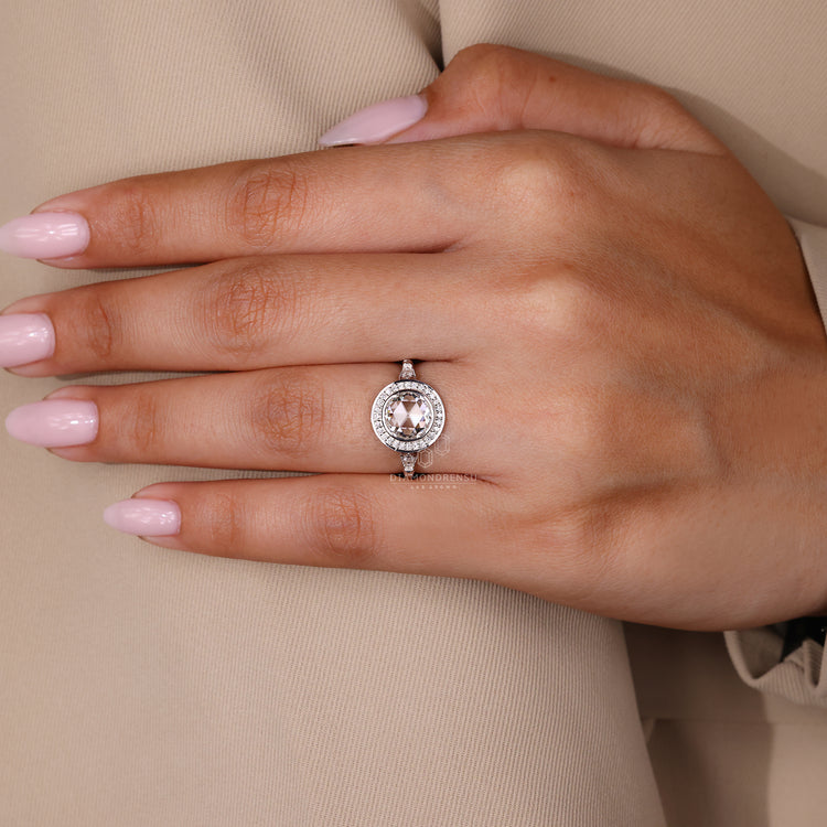 Rose cut diamond ring includes round centre stone.