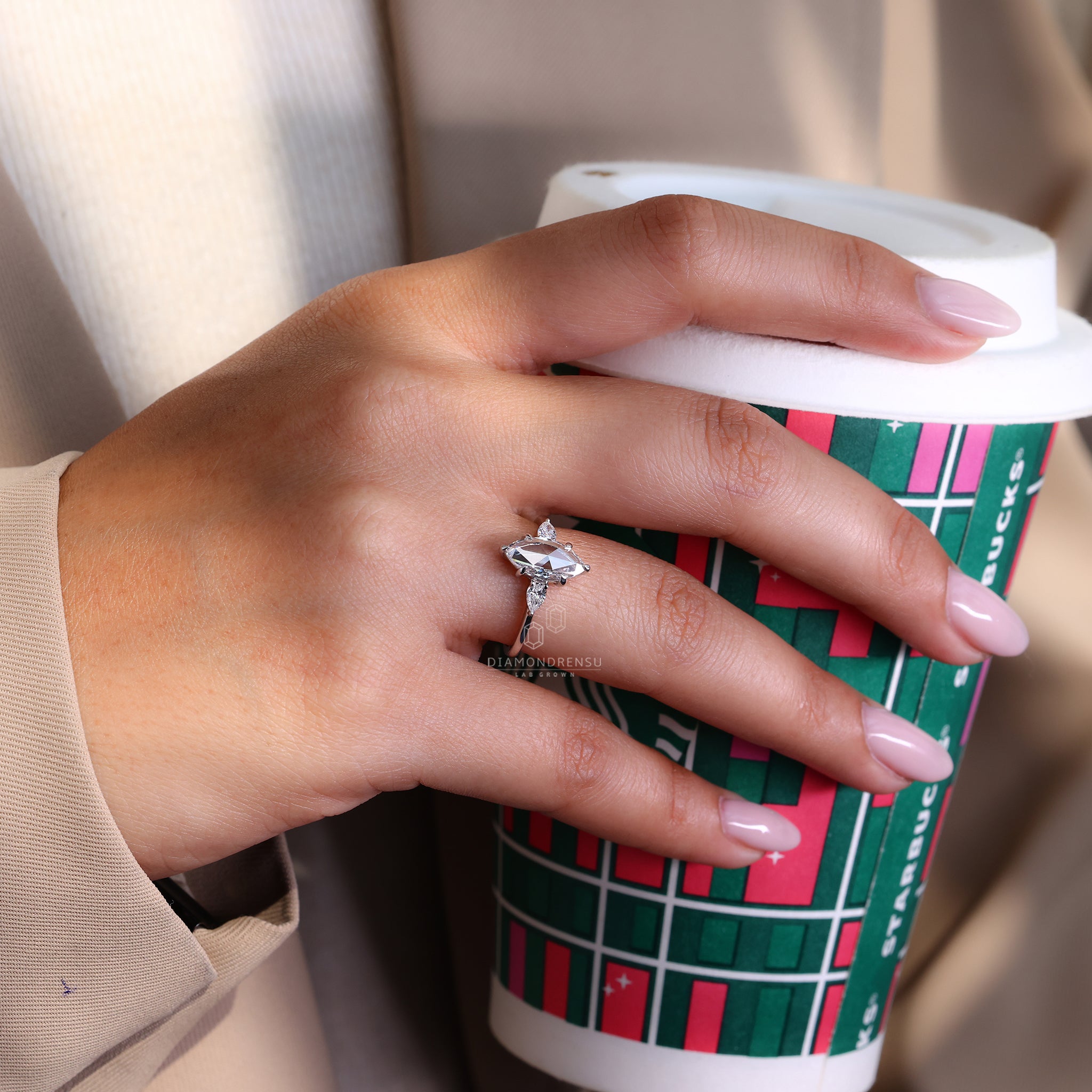 Three Diamond engagement ring made using rose cut design.
