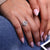 Pave setting ring adds small diamonds on top Pave setting ring adds small diamonds on top