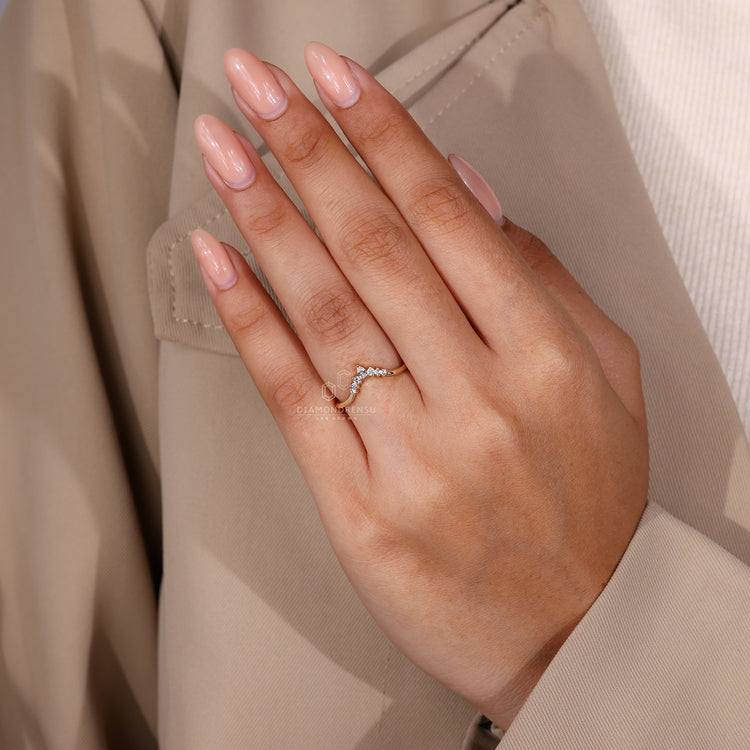 Handmade jewellery showcasing a 7 stone prong set diamond band.