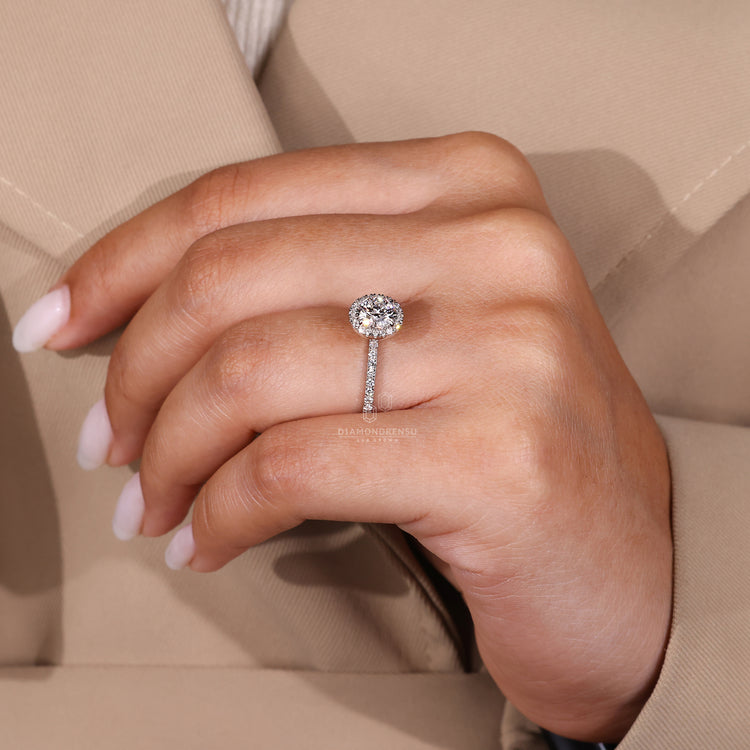 Custom engagement ring with round halo and hidden accents.