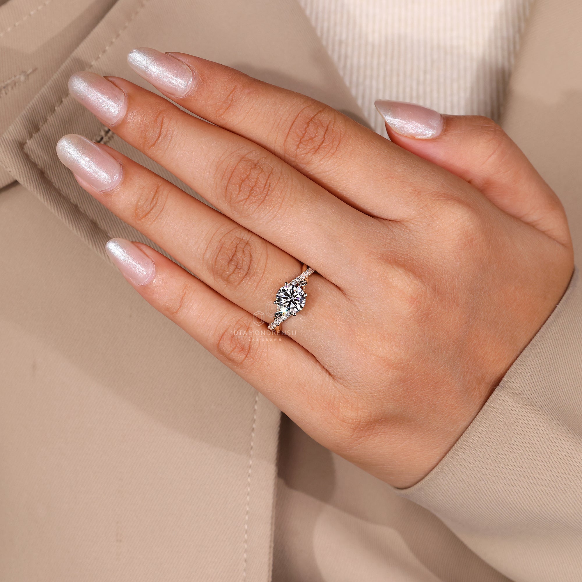 Twisted engagement ring with lab grown diamond.