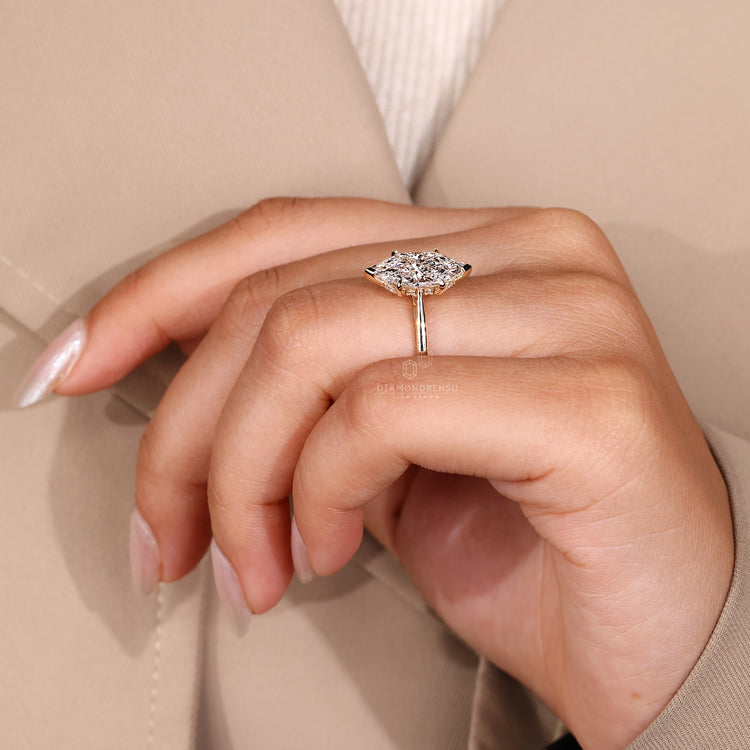 Round hidden halo setting with V and claw prongs.