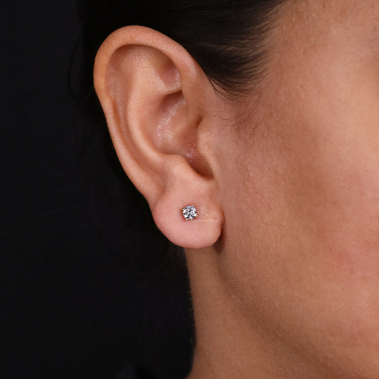 Handmade yellow gold stud earrings.