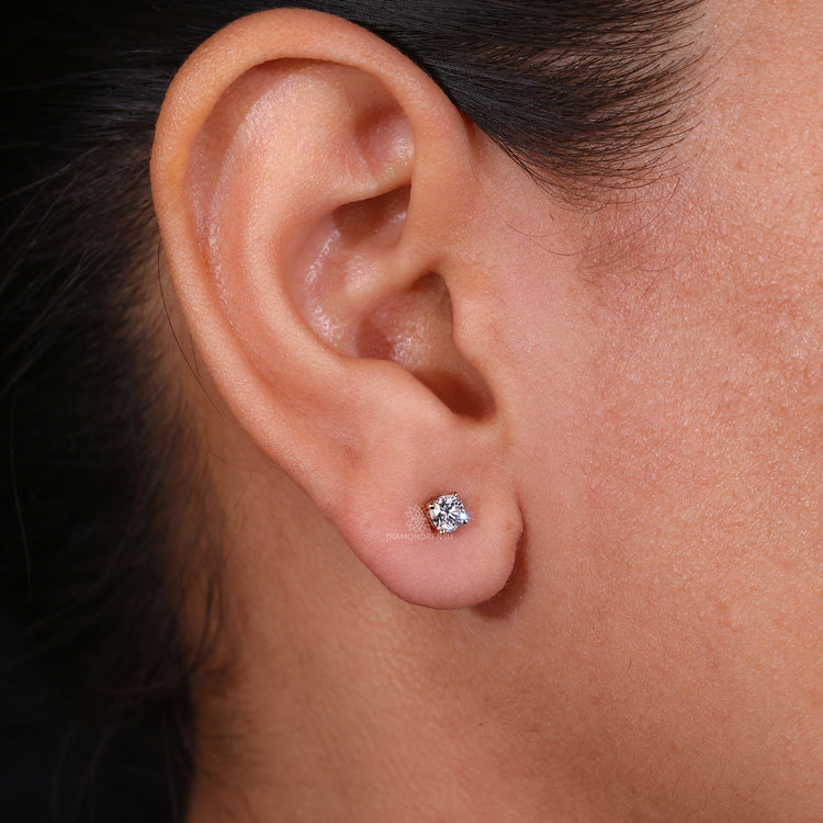 Four prong setting diamond studs.