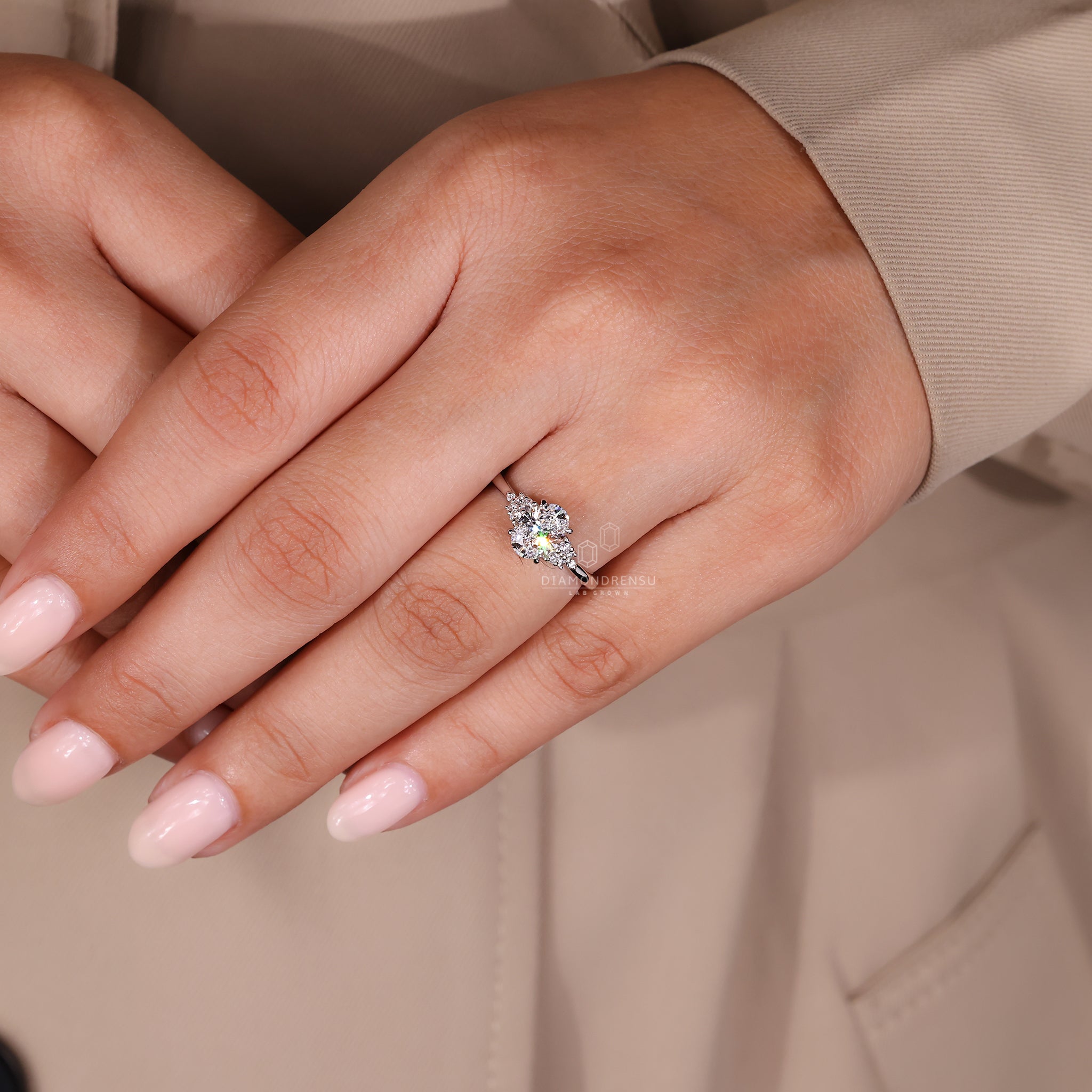 White gold oval engagement ring with prong setting