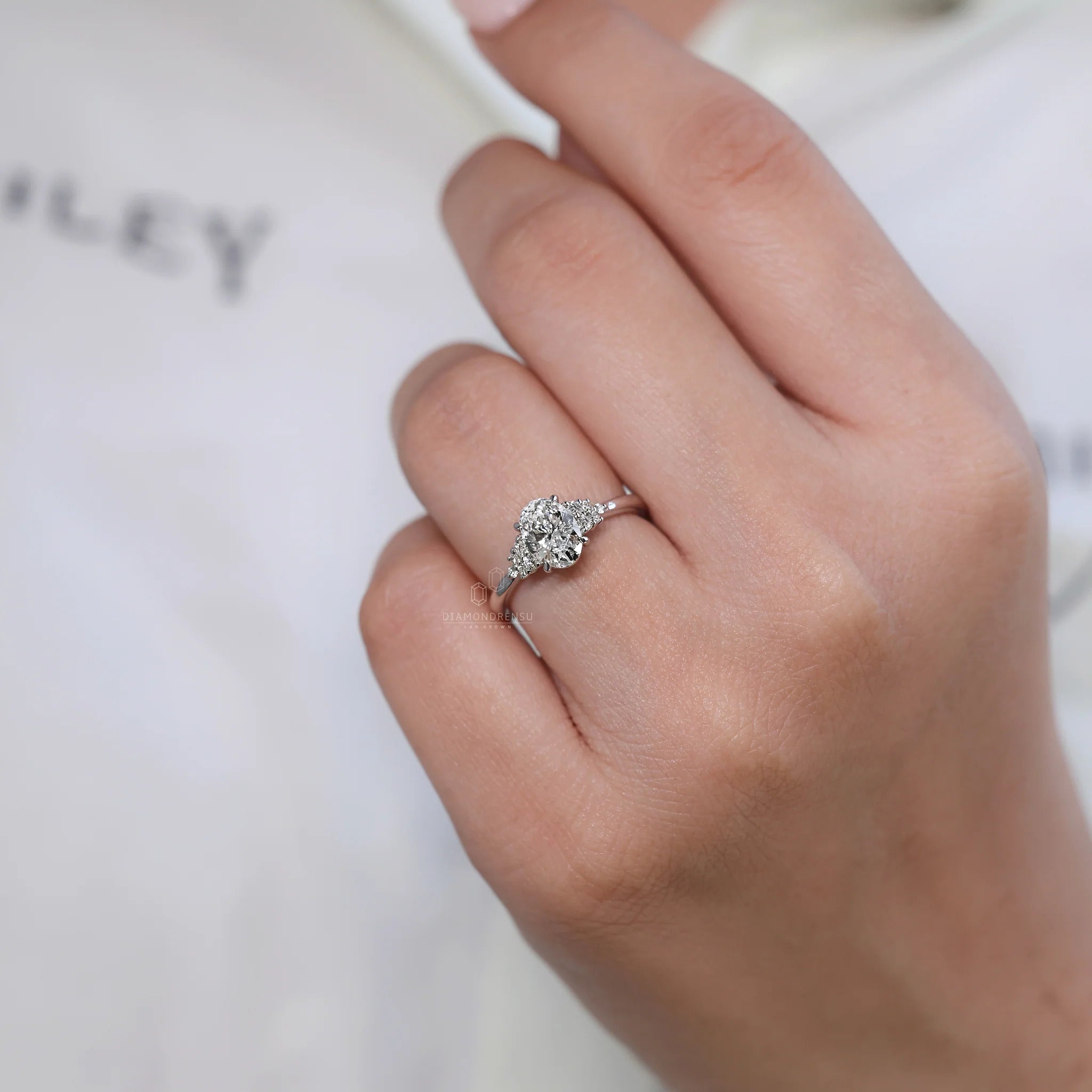 4 claw prong oval diamond ring in white gold