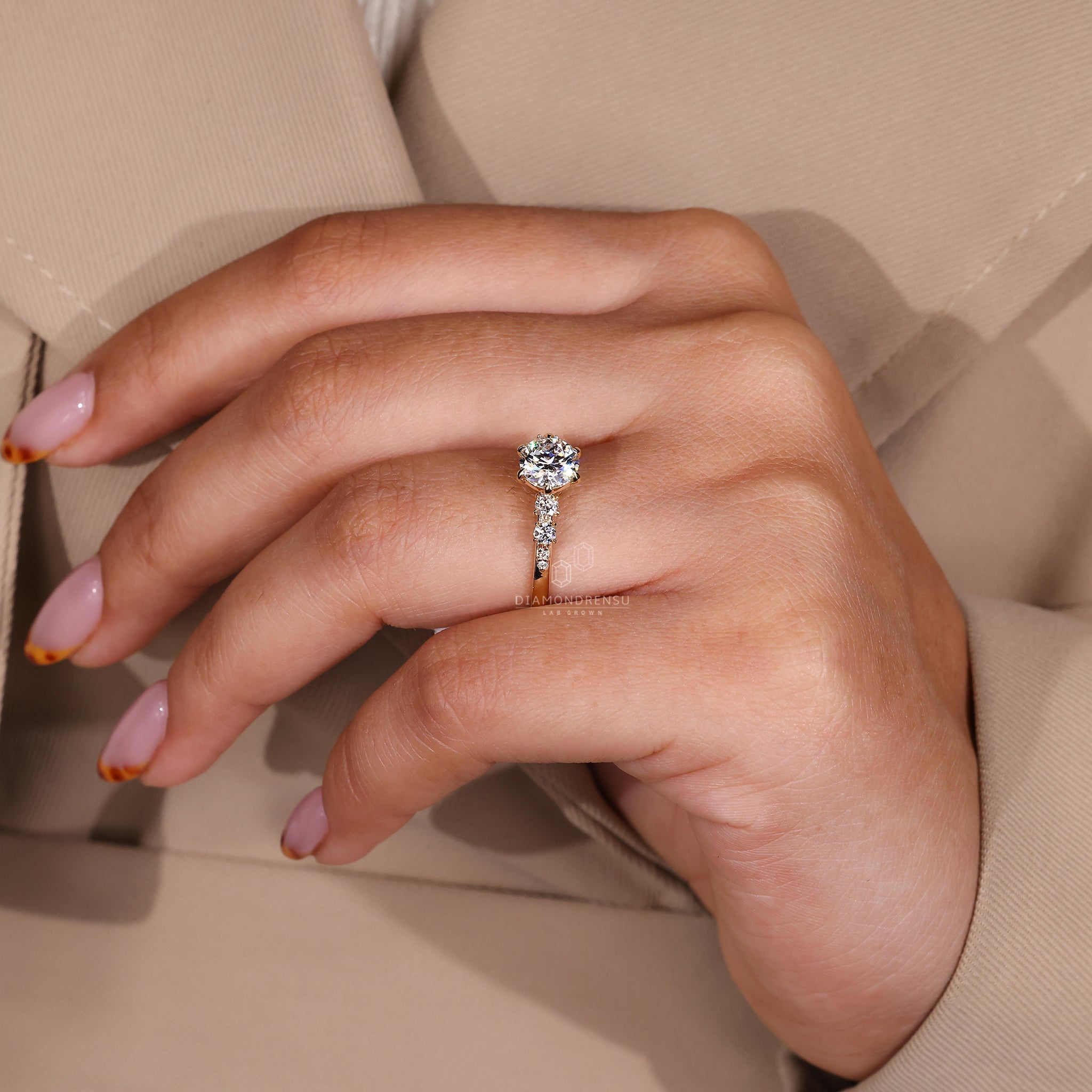 Custom engagement ring made in yellow gold ring finish.