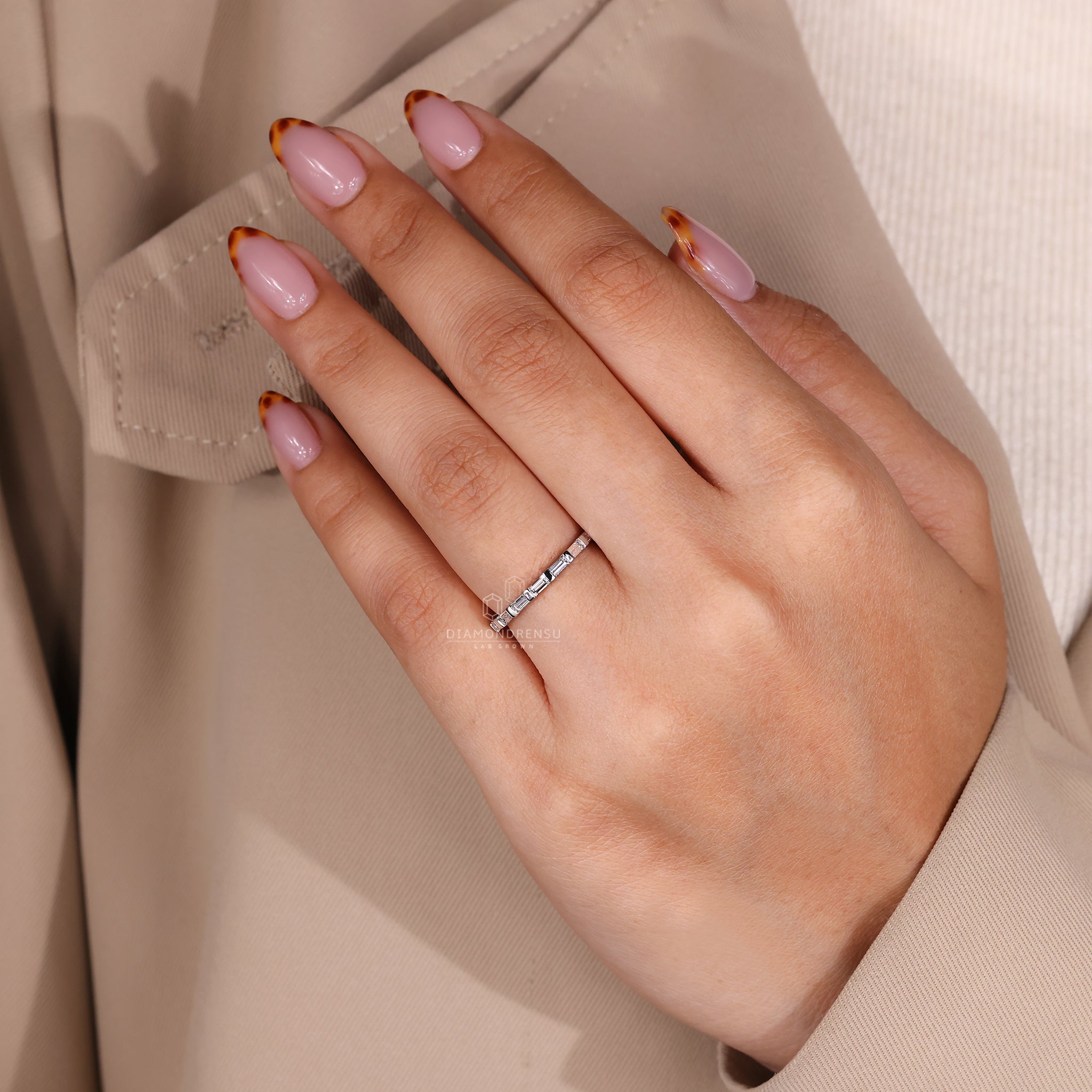 Handmade band featuring baguette diamonds and classic full design.