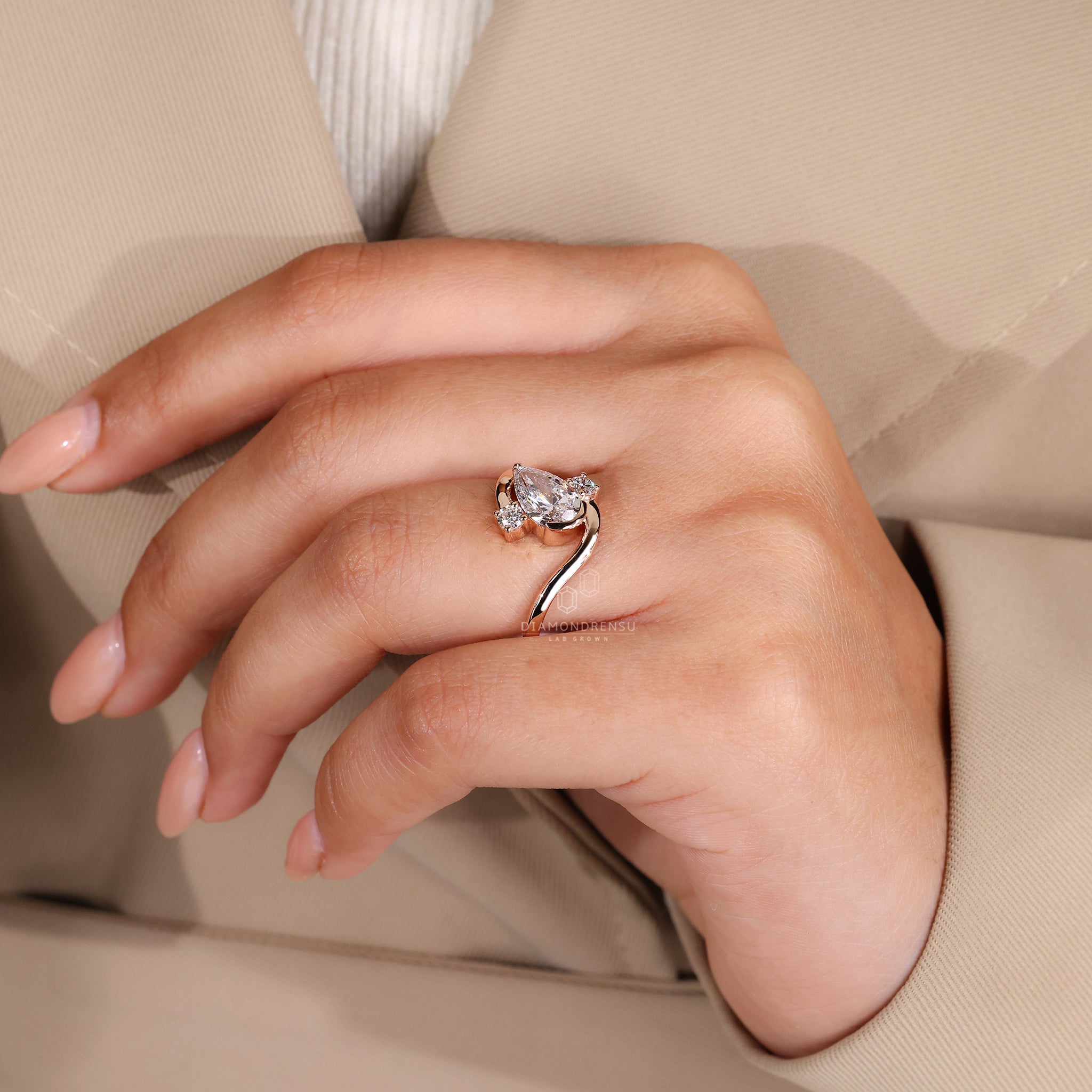 Round side stone ring with lab grown diamonds.