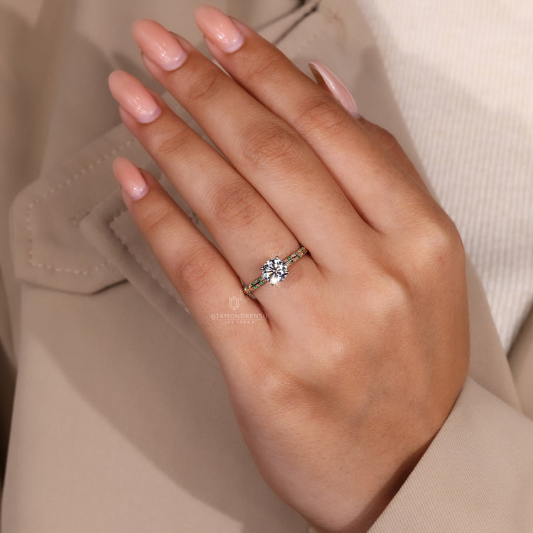 UK engagement ring with emerald round cut diamond.