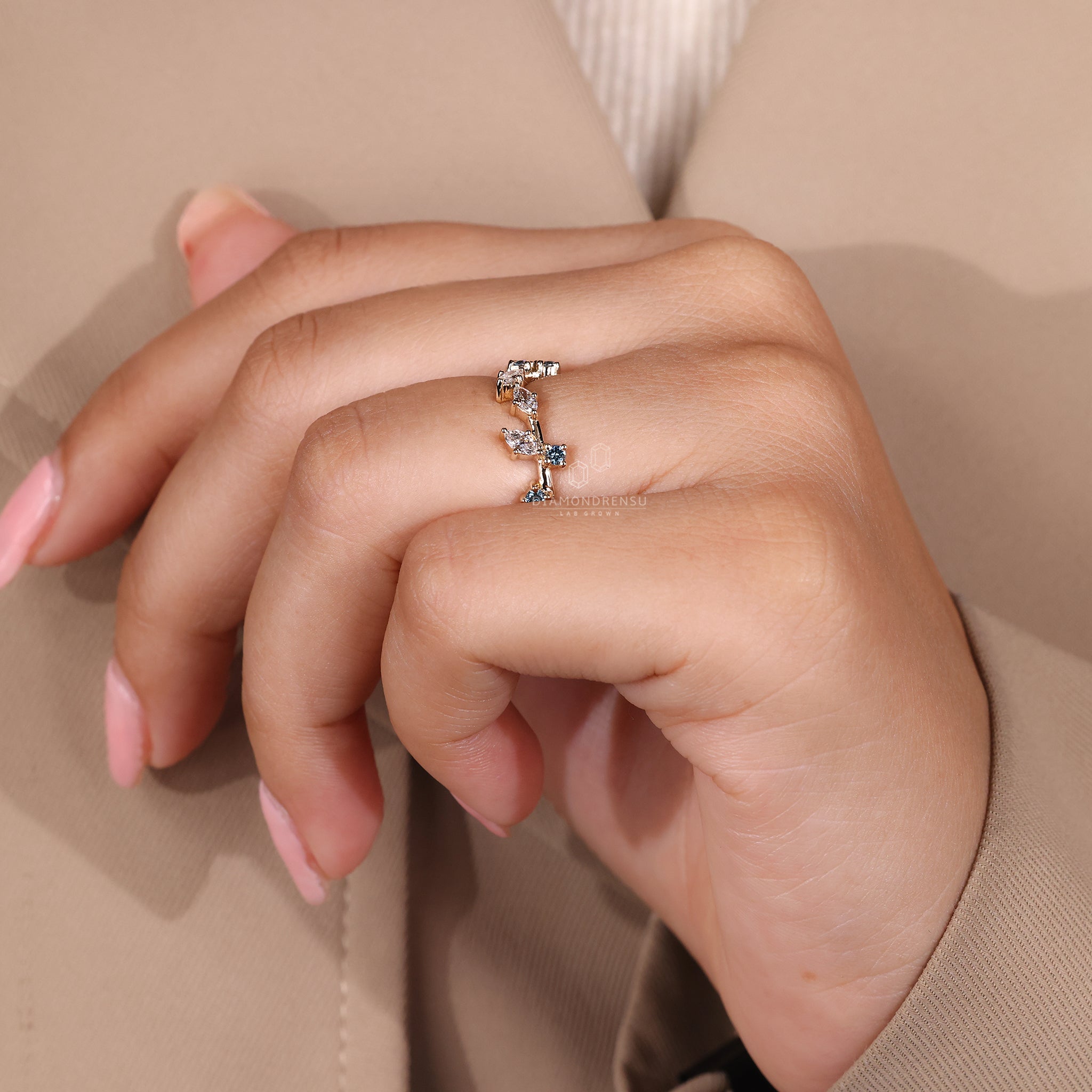 Yellow gold diamond band with marquise accents.