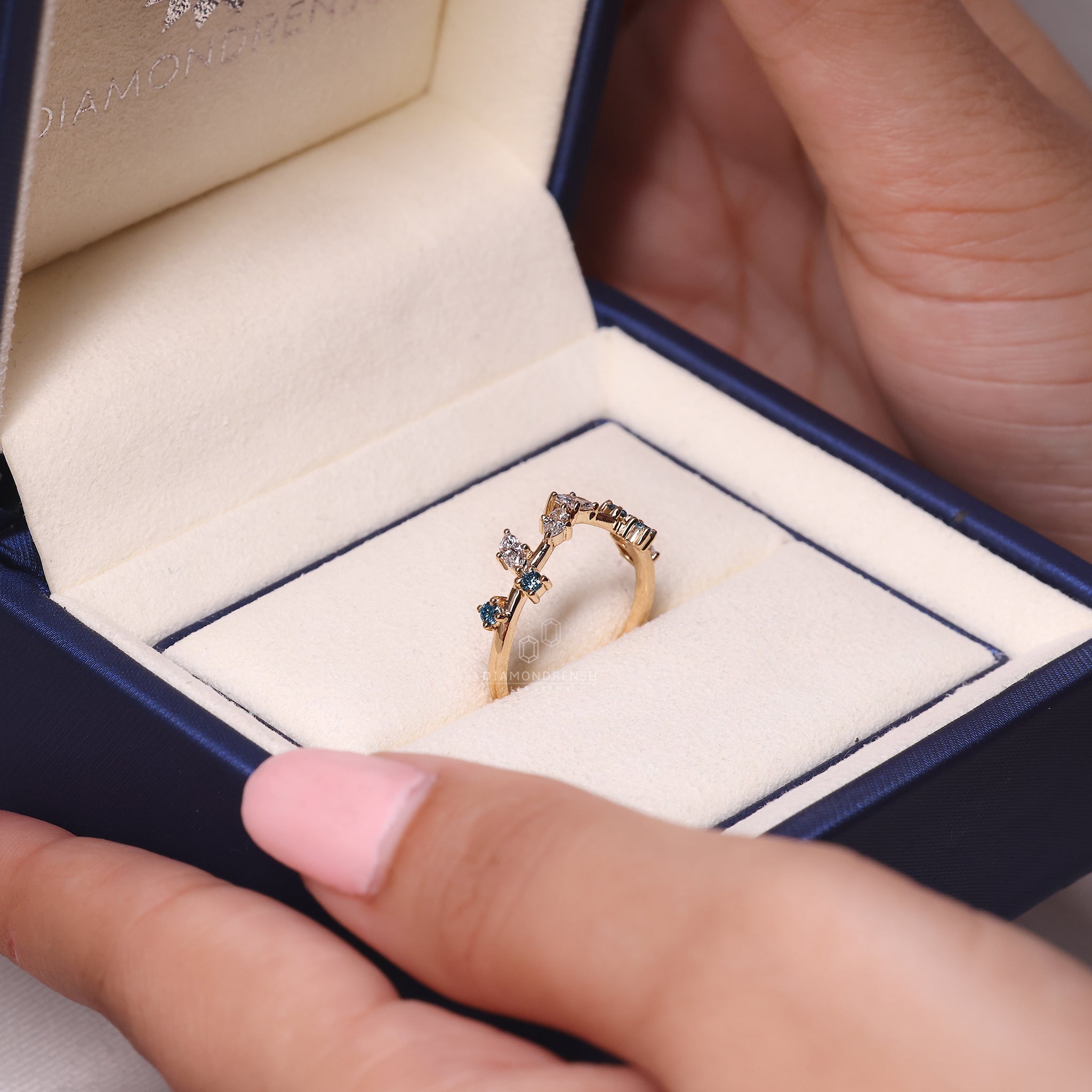 Nature inspired wedding band with a yellow gold finish.