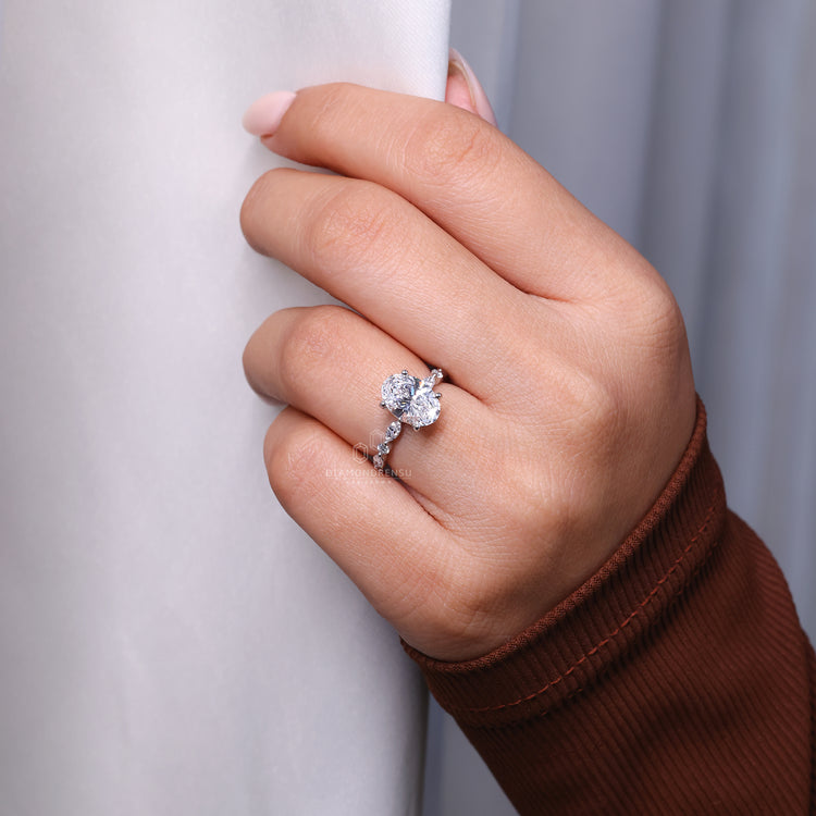 Shared prong engagement ring with round diamonds