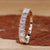 Elegant baguette diamond eternity band, showcasing its unique and linear diamond arrangement Elegant baguette diamond eternity band, showcasing its unique and linear diamond arrangement