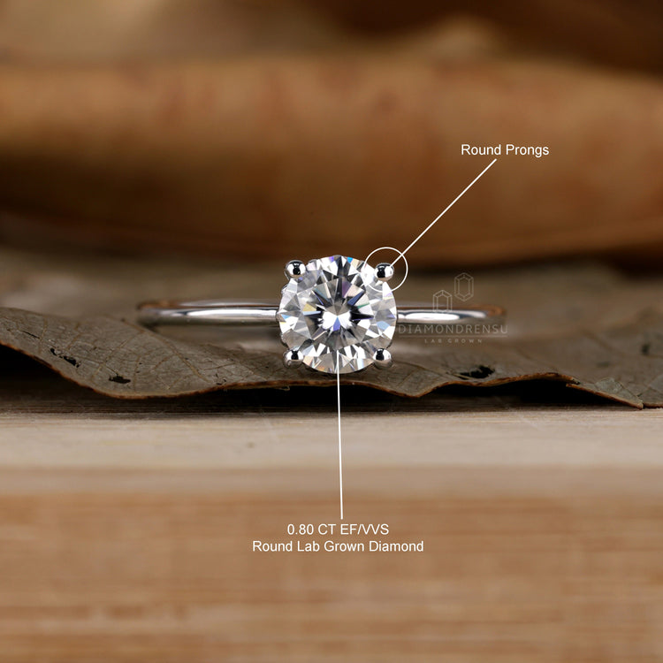 Radiant round cut diamond showcased in a uk engagement ring.