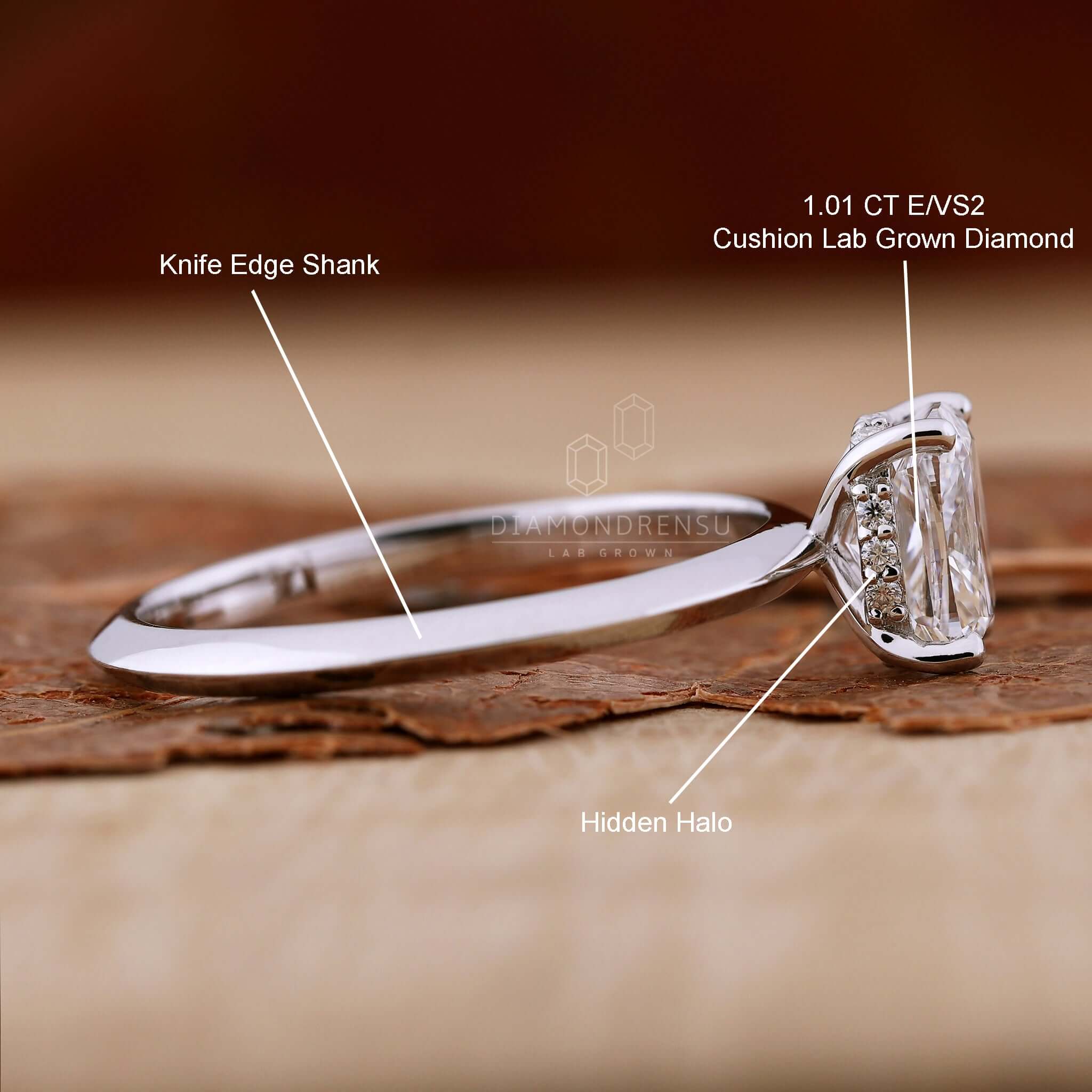 Knife edge shank paired with a 4 prong diamond ring for a unique engagement ring style.