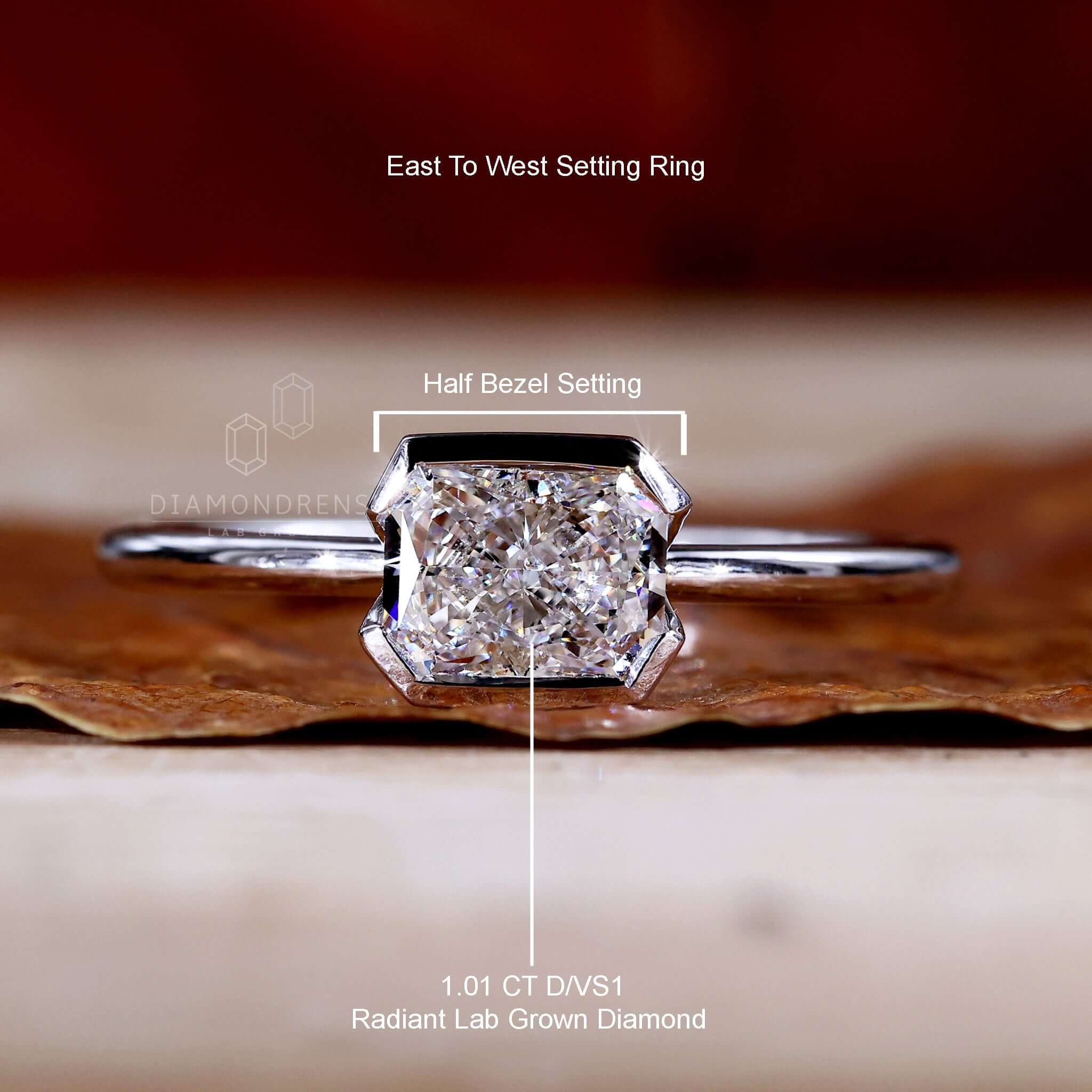 Diamond ring UK with a radiant cut diamond and East to West ring style for understated elegance.