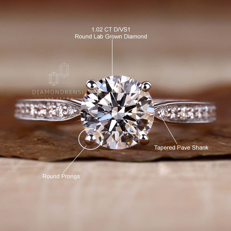 4 prong diamond setting crafted with igi certified diamonds, perfect for bespoke UK engagement ring designs.