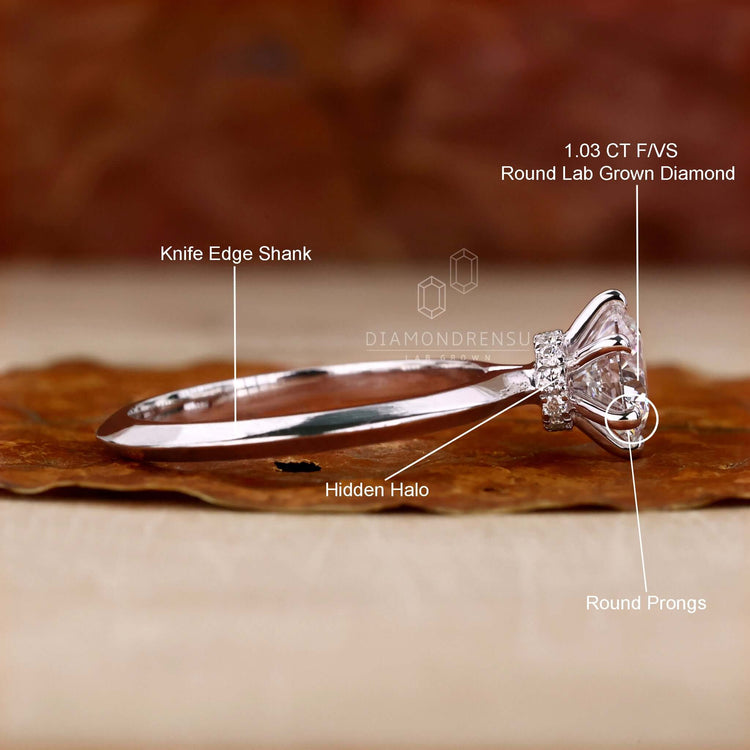 Unique engagement ring crafted with handmade jewellery and a round diamond, designed for elegance and durability.