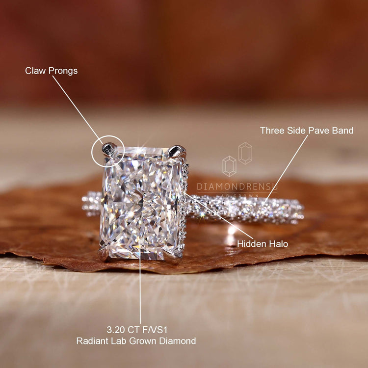 3-sided pave engagement ring with radiant cut centre diamond.