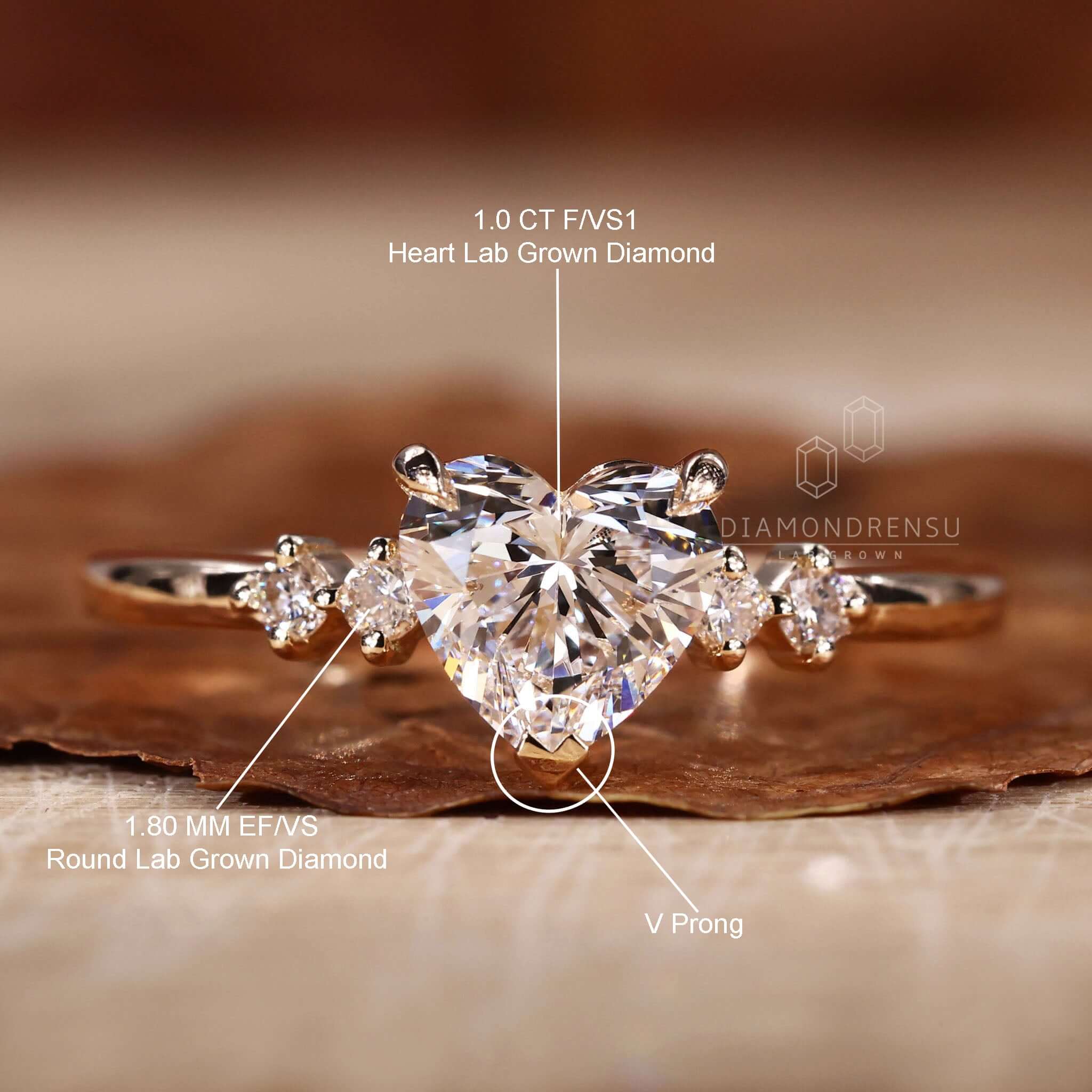 Claw prong setting engagement ring with a heart shape diamond and handmade design.