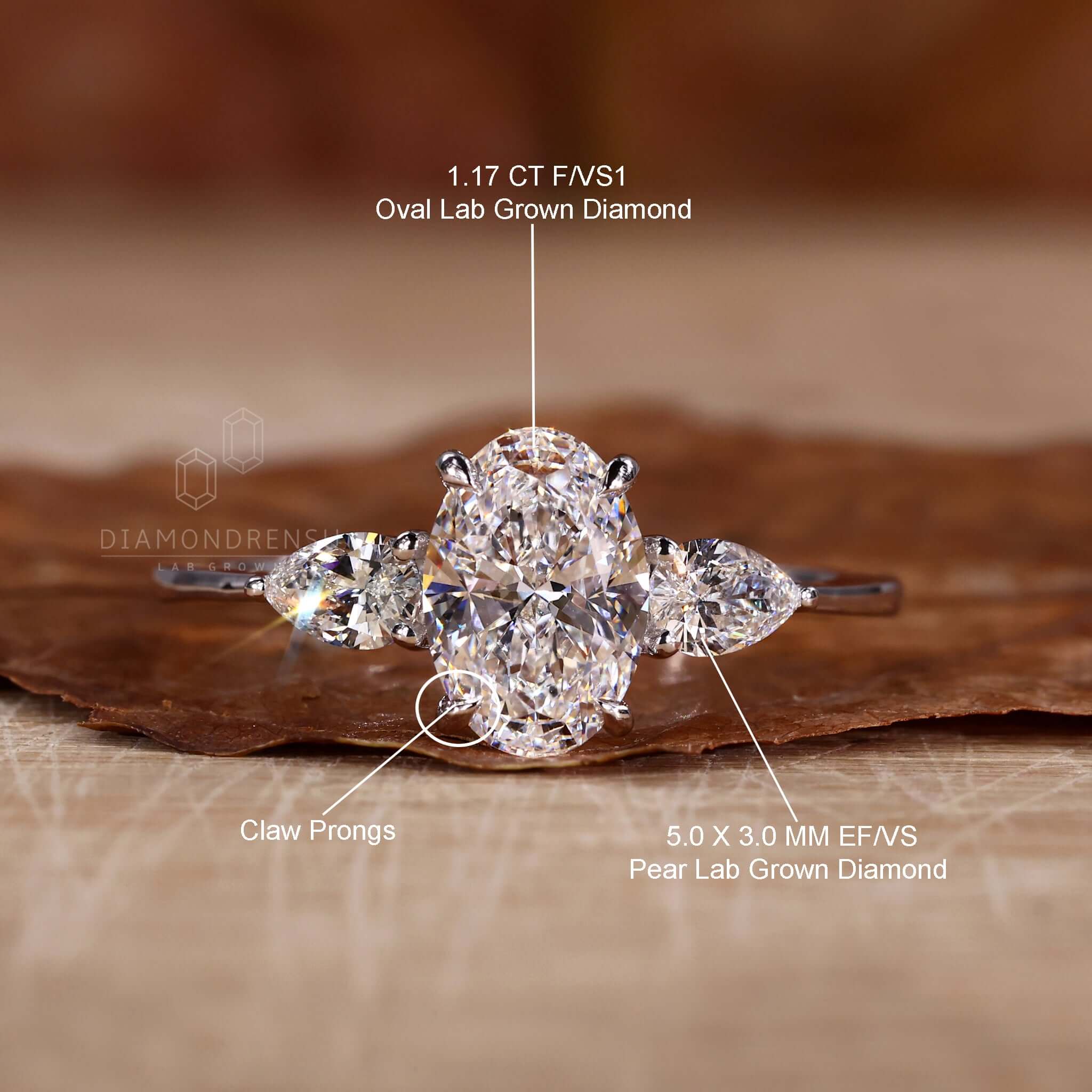 Pear shaped diamond ring in a unique setting, perfect for a custom engagement ring in the UK.