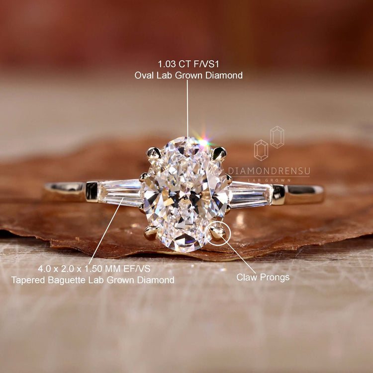 Baguette cut diamond ring in a three stone ring gold setting, ideal for elegant UK engagements.