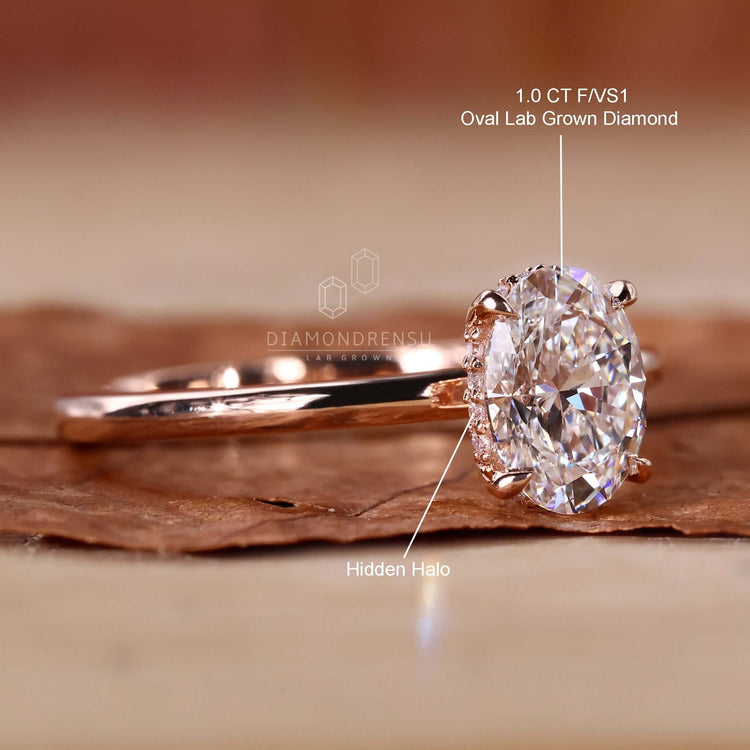 Handmade jewelry featuring hidden halo engagement ring.