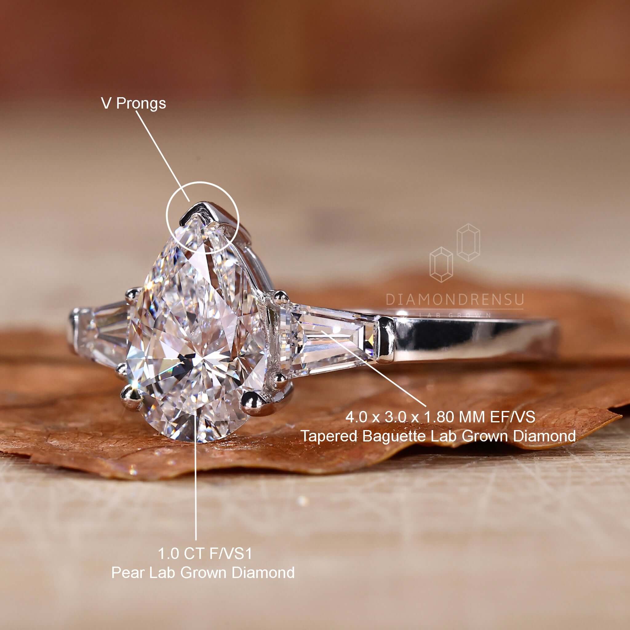 Diamond ring with tapered baguettes featuring exceptional craftsmanship.