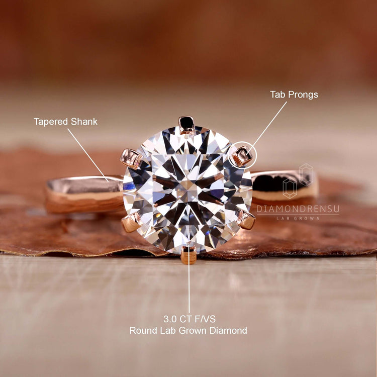 Exquisite solitaire diamond ring with a modern prong setting.
