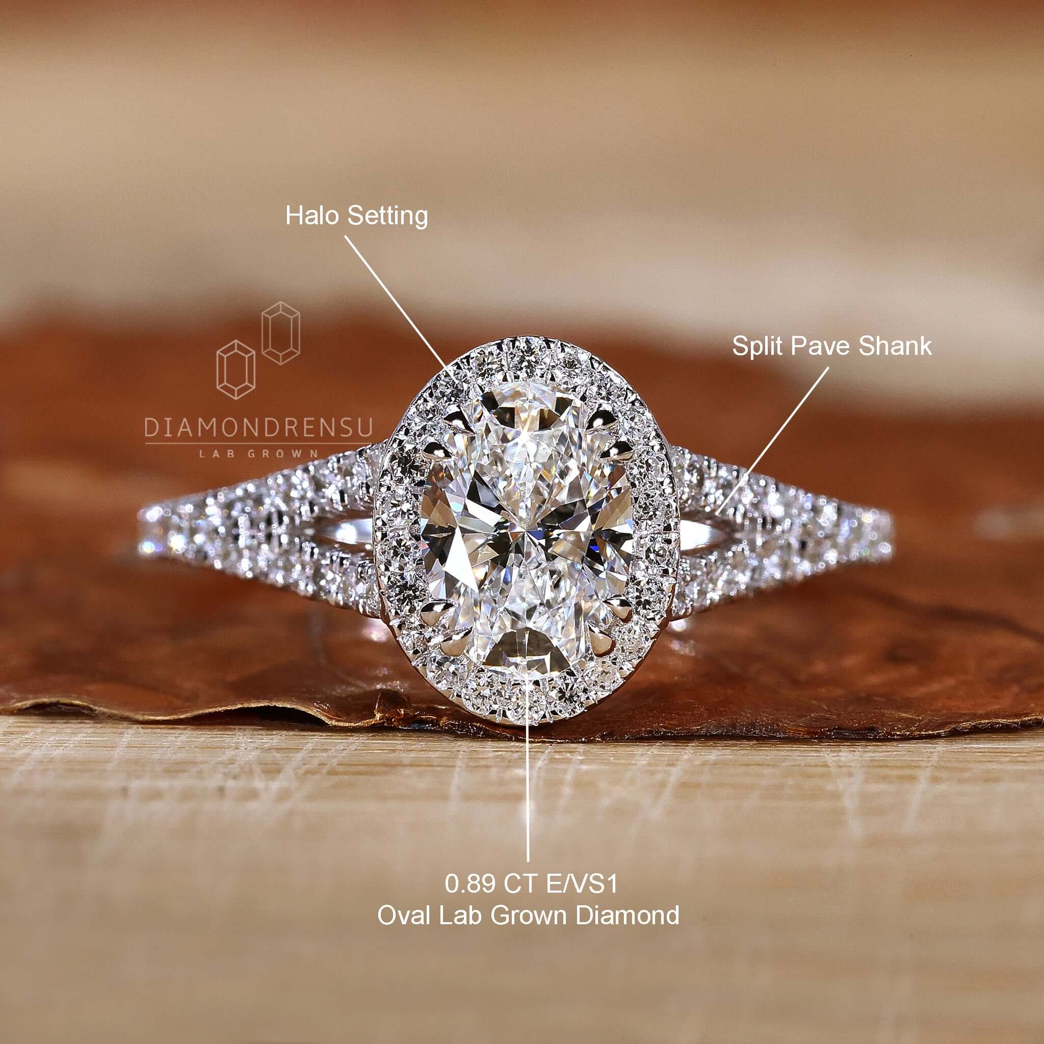 Cathedral setting ring with oval diamond and handmade finish.