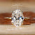 A beautiful oval ring with a brilliant diamond centrepiece for a timeless look. A beautiful oval ring with a brilliant diamond centrepiece for a timeless look.