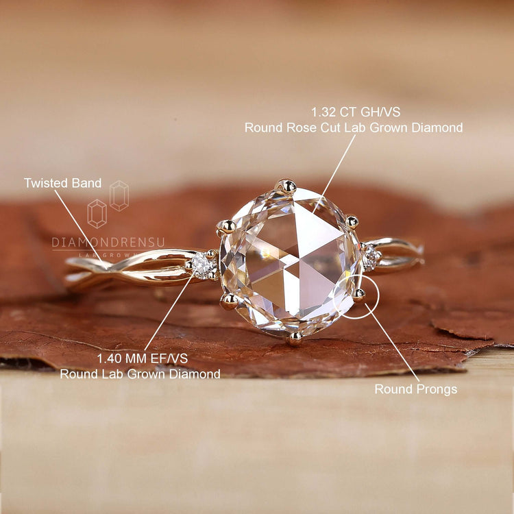 UK engagement ring designed with a round rose cut diamond for a unique and timeless look.