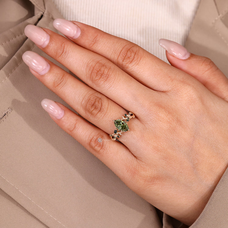 Lab grown diamond ring with green centre diamond.