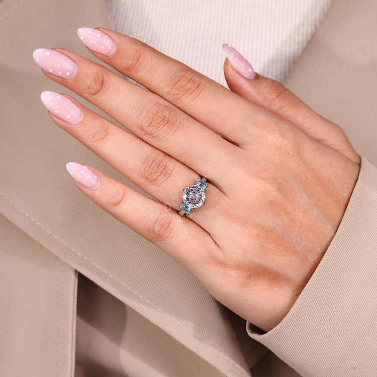 Portuguese cut diamond ring with tulip setting and sapphires.
