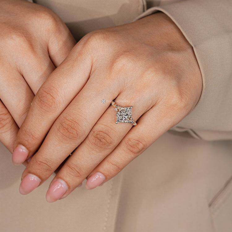 Nature inspired diamond ring with Dutch marquise centre stone.