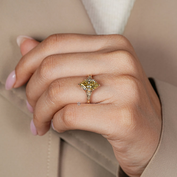 Vintage style ring with yellow marquise cut diamond.