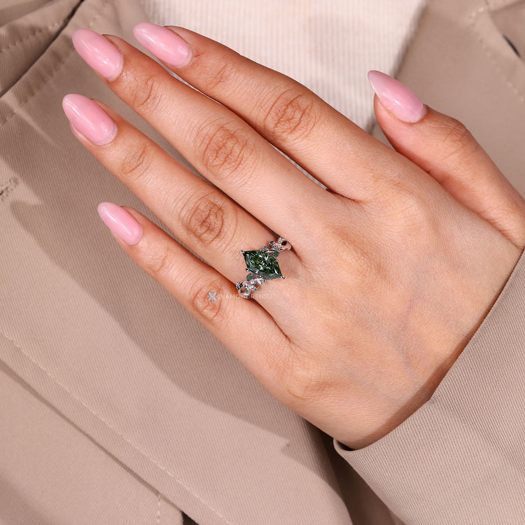 IGI certified marquise ring with round moss agate accents.