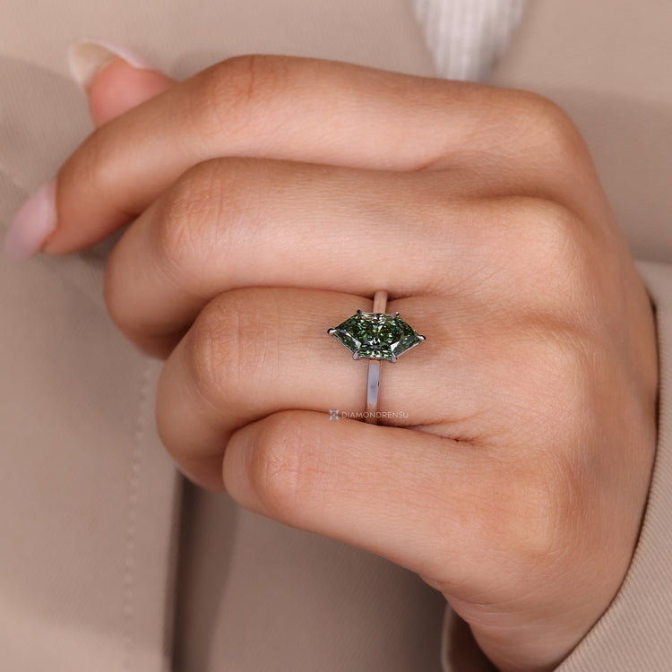 Dutch marquise solitaire ring with cathedral setting.