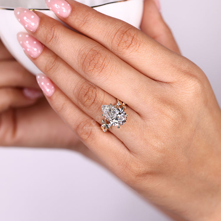 Nature inspired ring with cluster setting and leaf work