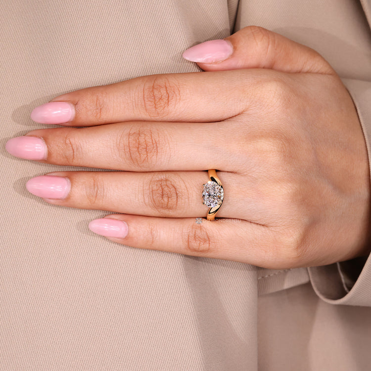 Oval cut diamond ring with pinky style setting.