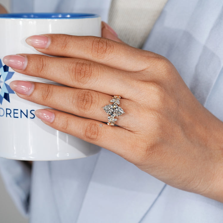 Handmade marquise diamond ring with six claw prongs.