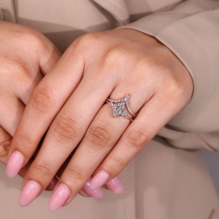 Bridal set with marquise and round diamond band.