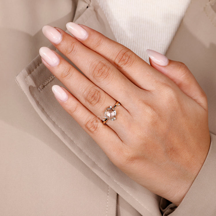 Yellow gold ring with 7 stone diamond cluster.