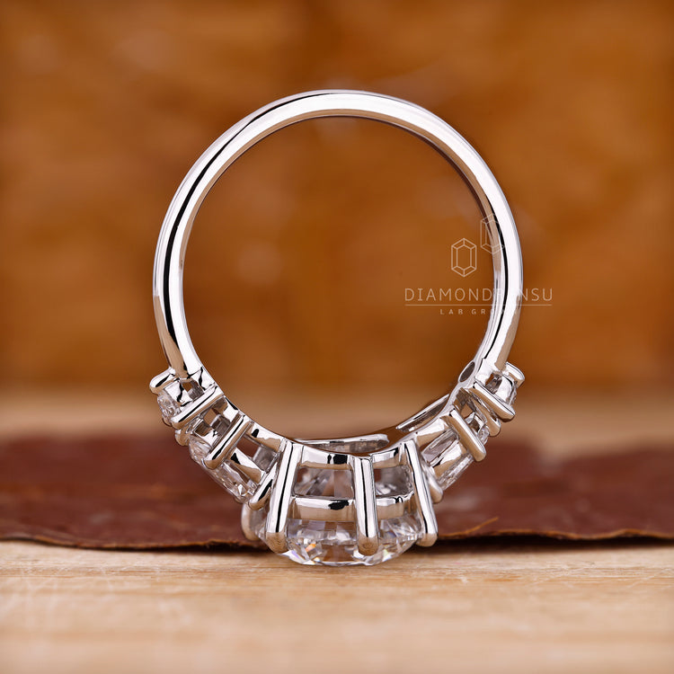 Buy engagement ring with round cut and white gold band.