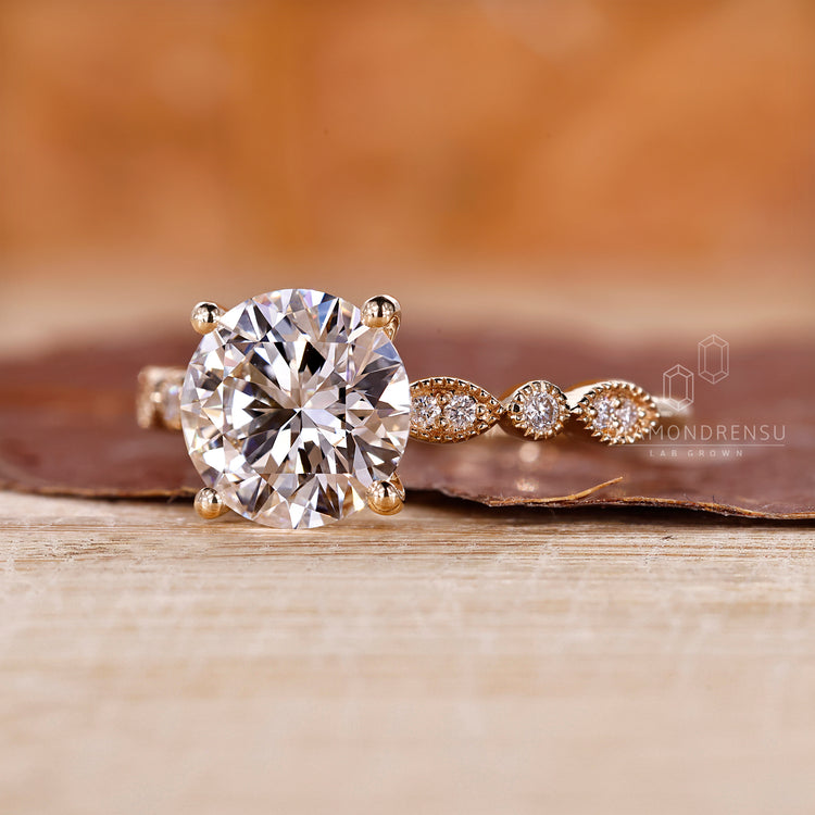 4 prong ring with lab grown round diamond.